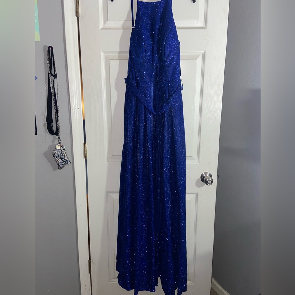 Dark, sparkly blue prom dress. Only worn once at my prom.